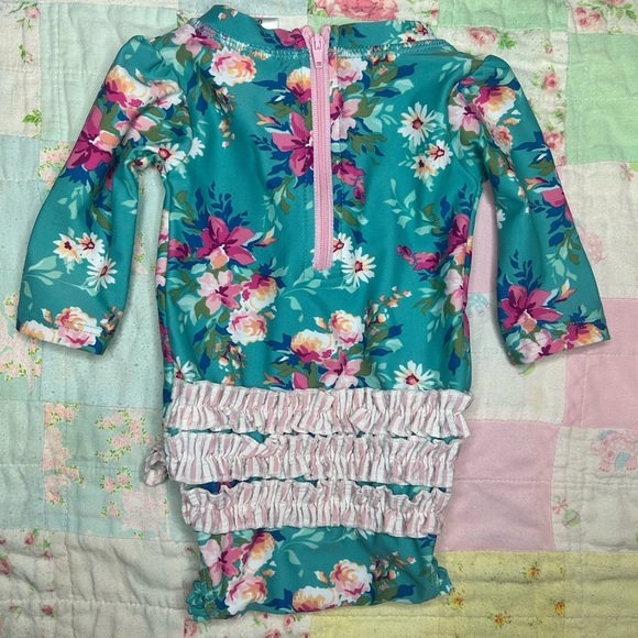 RuffleButts BabyLong Sleeve UPF50+ One Piece Rash Guard - Fancy Me Floral - Picture 6 of 7